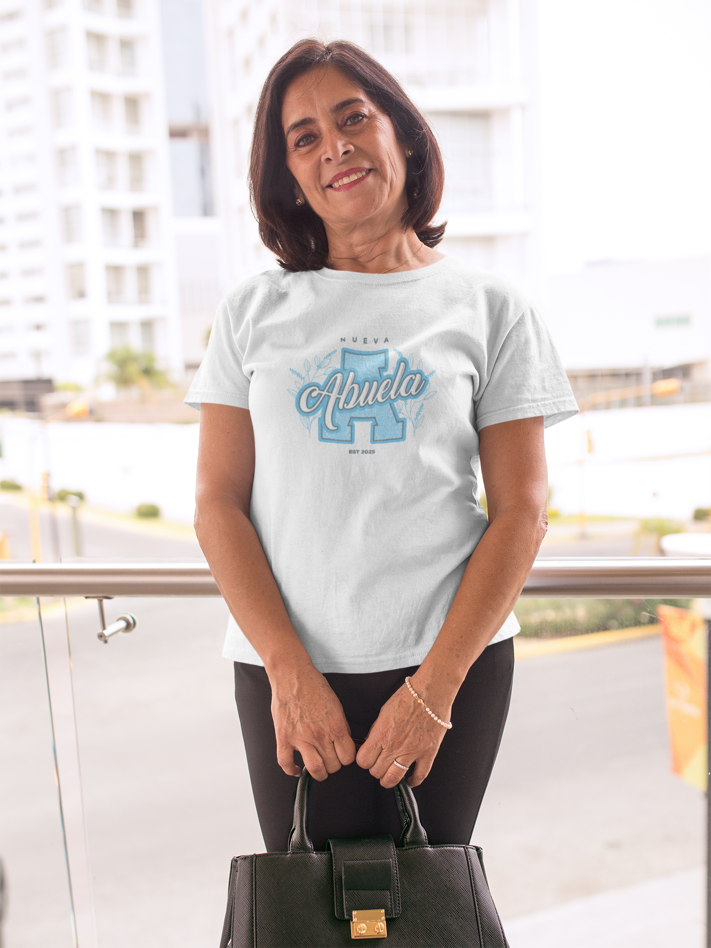 portrait-of-an-elder-woman-wearing-a-t-shirt-mockup-holding-a-bag-a20358