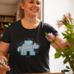 t-shirt-mockup-of-a-happy-woman-fixing-up-a-flower-vase-32203 (5)