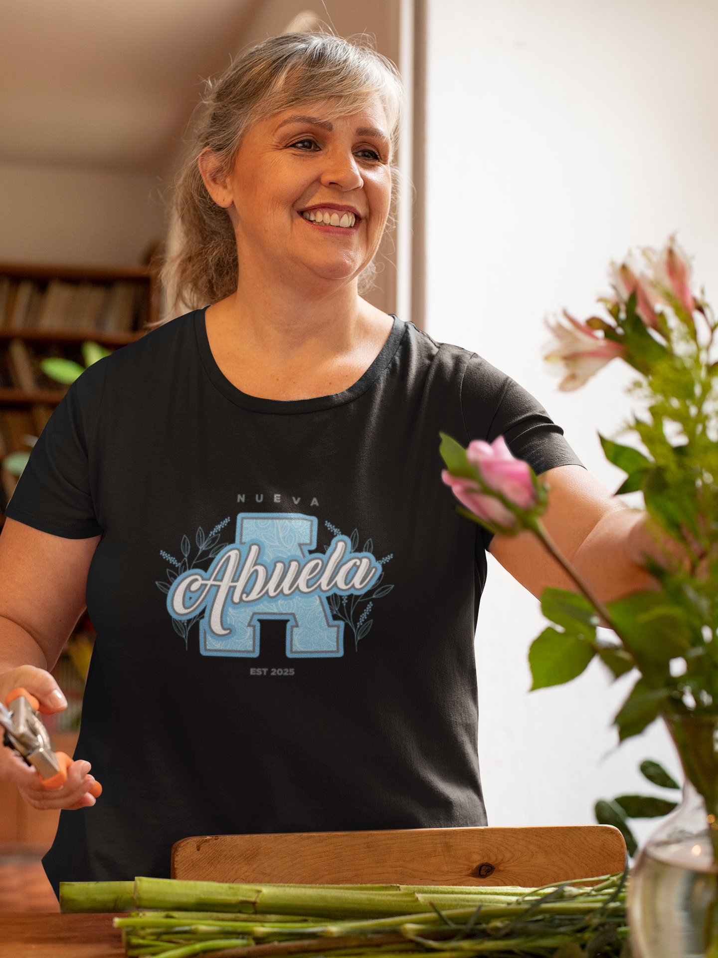 t-shirt-mockup-of-a-happy-woman-fixing-up-a-flower-vase-32203 (5)